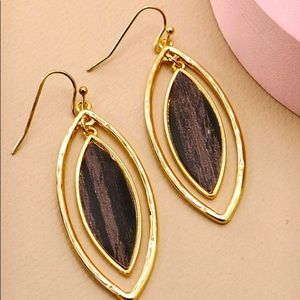 Black Leaf earrings with natural cork gold flecks that looks like a teardrops